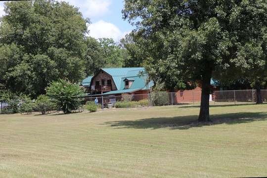 Park restroom building with George Jones Country mural